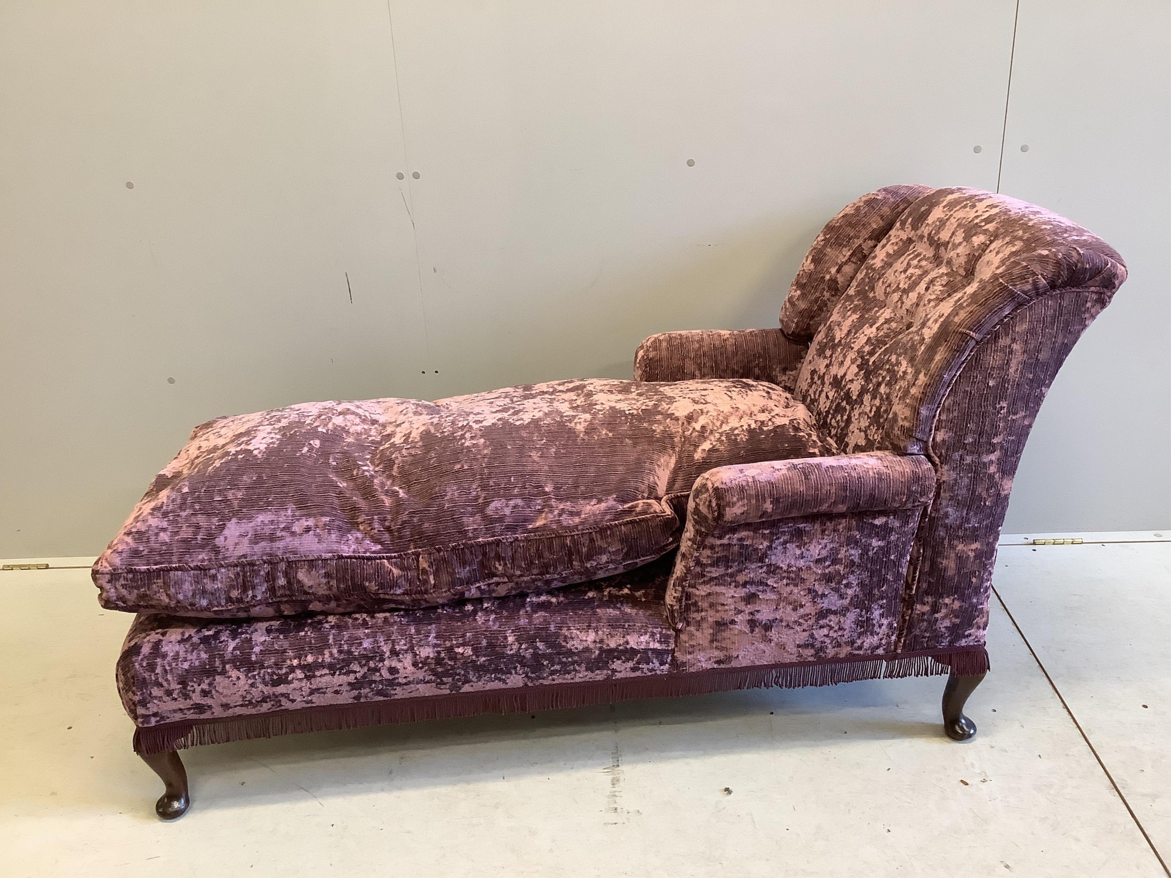 An early 20th century day bed, re-upholstered in contemporary buttoned purple fabric, width 160cm, depth 67cm, height 84cm. Condition - good